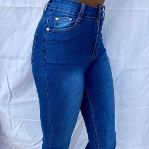 Fashion Nova high waisted medium wash skinny jeans